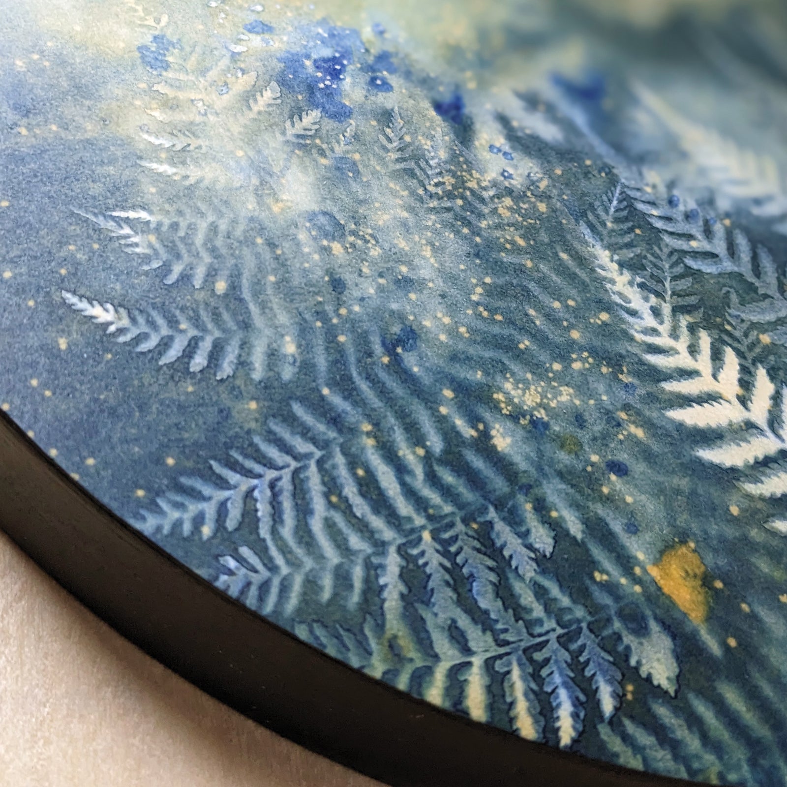 Detail of "Woodland Stardust", fern and nigh sky inspired eco-printed cyanotype artwork by Sarah Treanor.