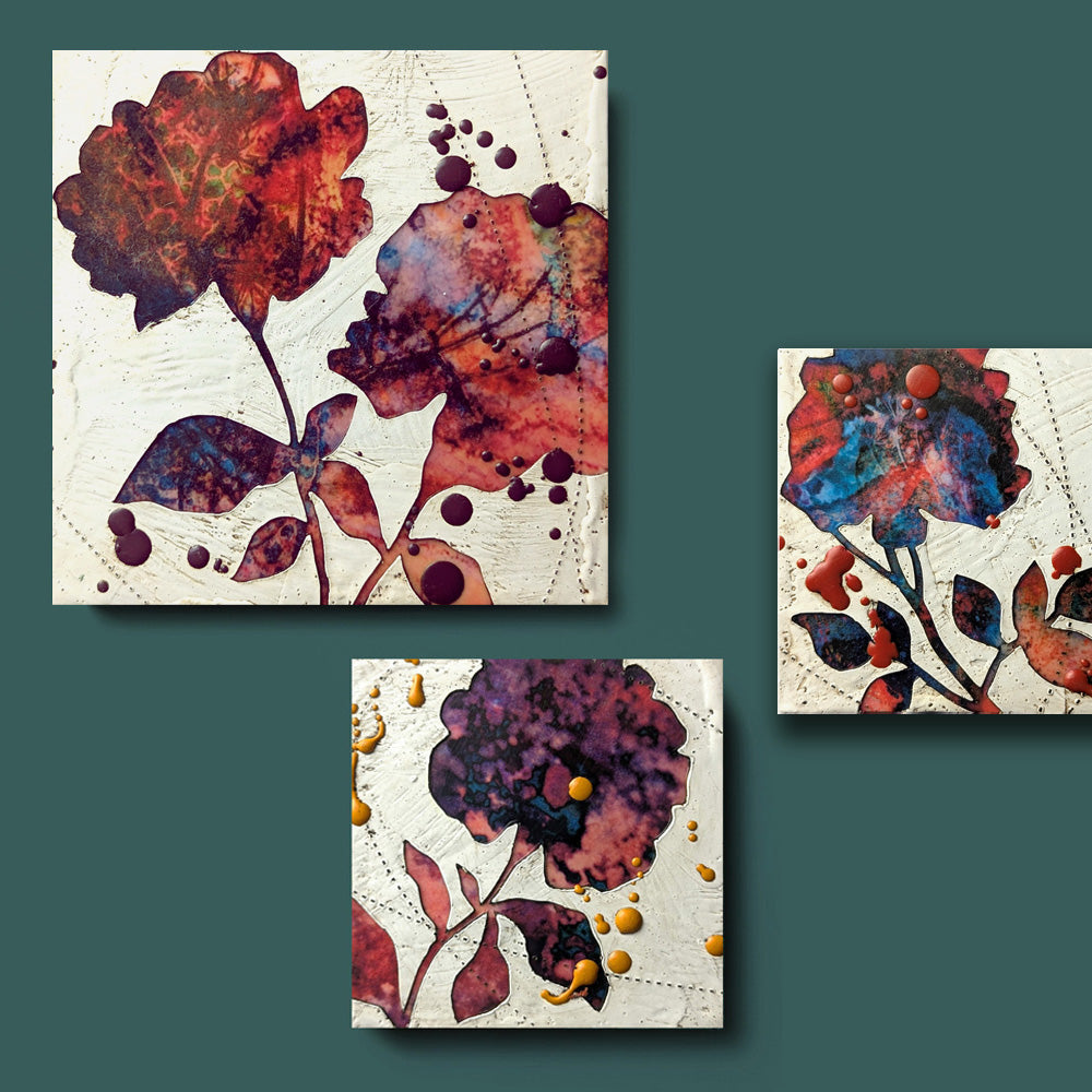 Small mixed media paintings by artist Sarah Treanor. Red and purple textural, floral artwork created with digital prints of the  artist's cyanotypes and eco prints underneath layers of encaustic paint, with splatters of encaustic on top.