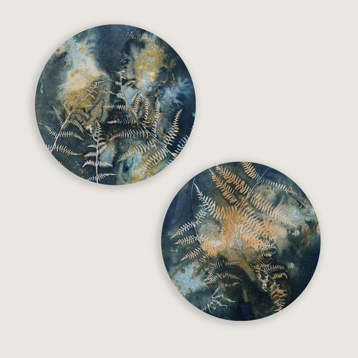 Two fern and night sky inspired eco-printed cyanotypes by artist Sarah Treanor. Available at larkandkey.com, Charlotte NC.