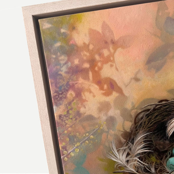 Oil painting depicting a bird's nest with two blue eggs, surrounded by soft botanical. Artwork by Sharon Cosgrove, set in a maple hardwood frame. Detail shown.