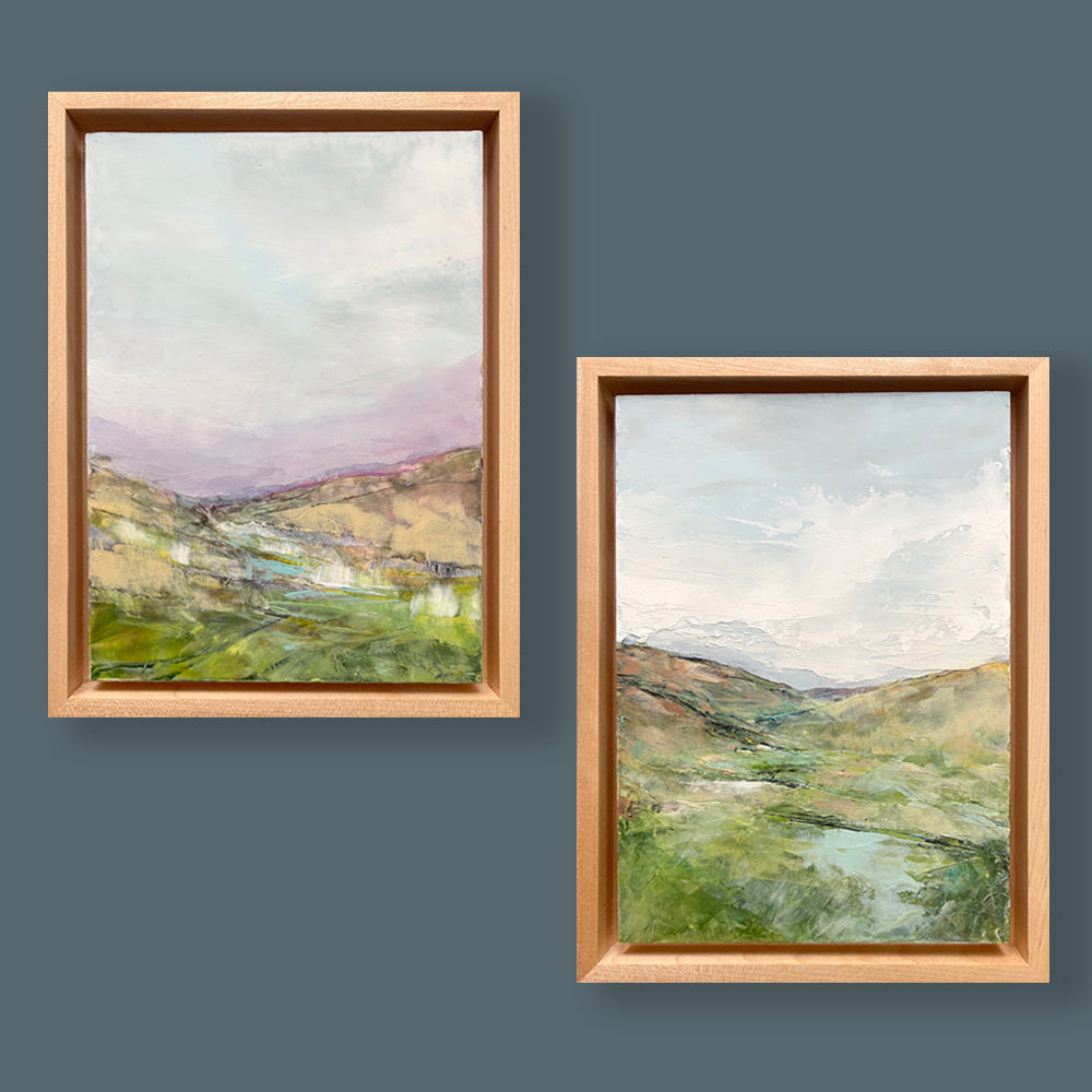 Small oil and cold wax, framed landscape paintings by Elizabeth Davant - shown on blue wall.