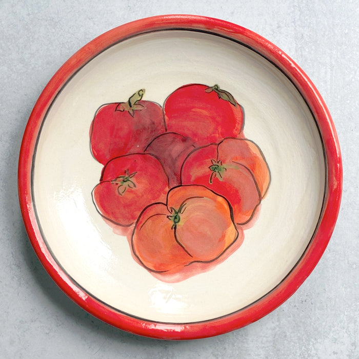 Handmade ceramic shallow serving bowl with tomato decoration by Molly Lithgo. 