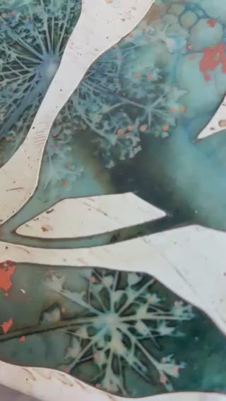 Video of Midnight Embers VI mixed media encaustic leaf artwork in rich blues with gold and copper leaf details.